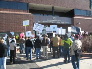 Protesters gather outside the USFS Rocky Mountain Regional Office