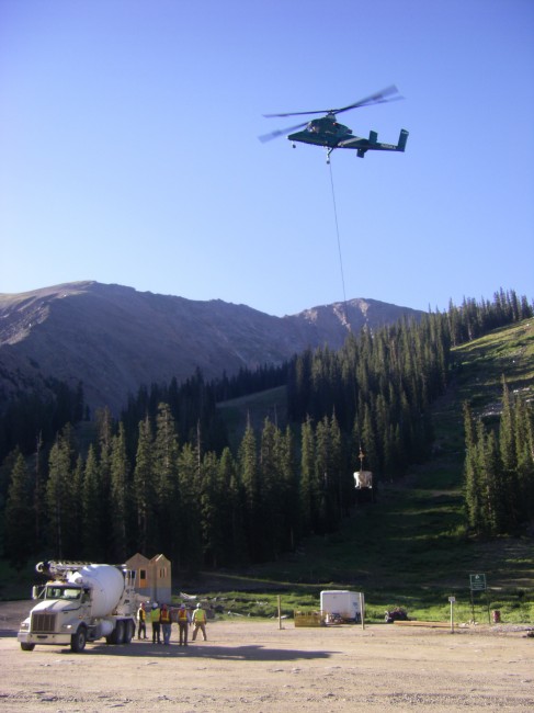 New Lift Construction Helicopter Lowering Cement