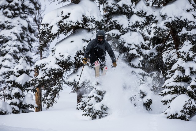 Blasting out of the trees and into the goods. Photo by Dave Camara from Arapahoe Basin.