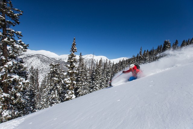 I wonder if he has a snorkel in that bag... Photo by Dave Camara courtesy of Arapahoe Basin.